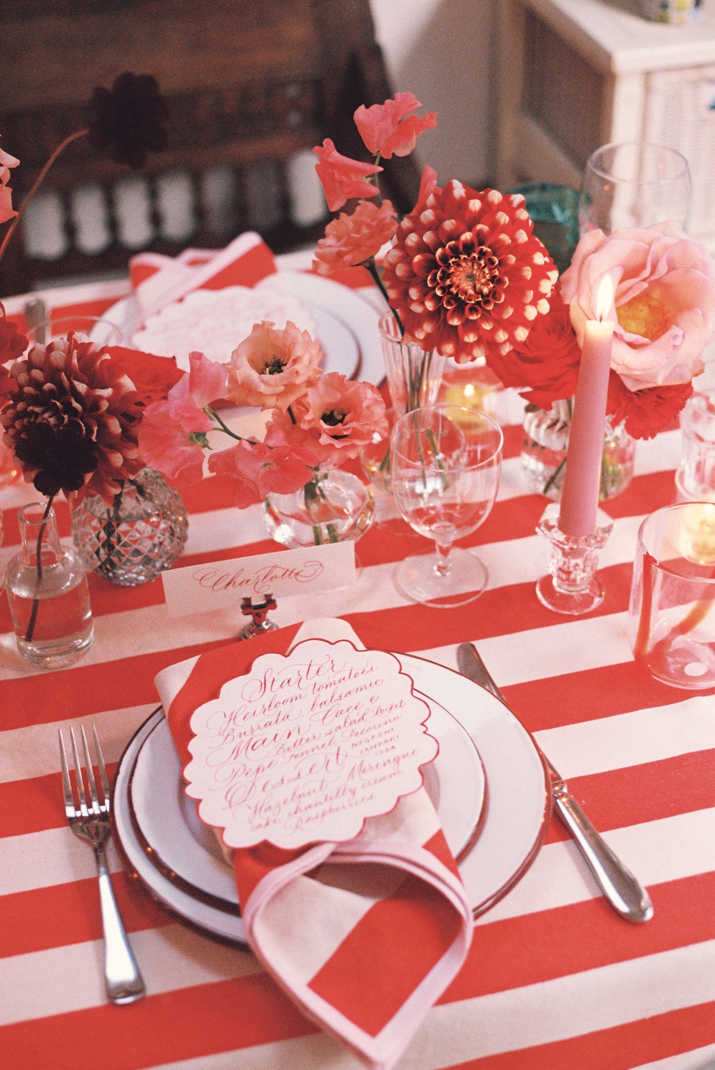 red striped napkin with pink edging