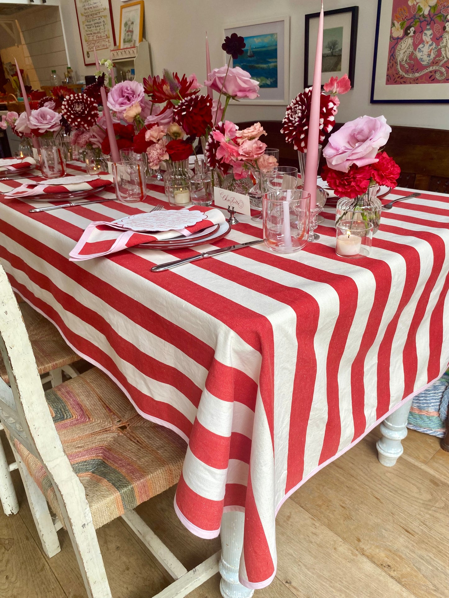 red striped tablecloth with pink edging