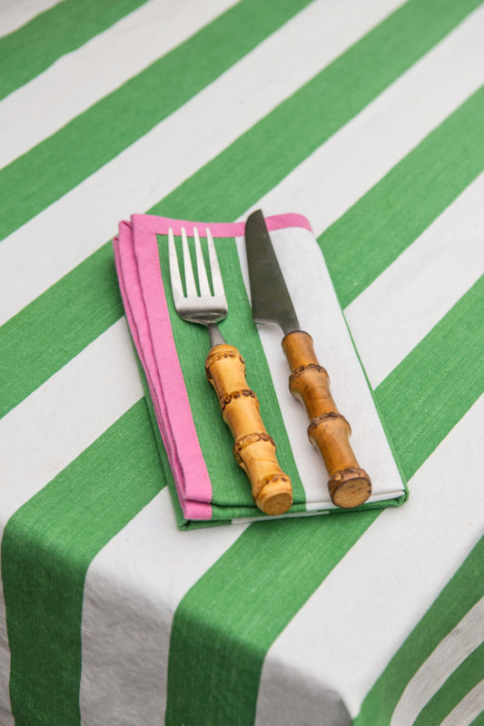 green striped napkin with pink edging